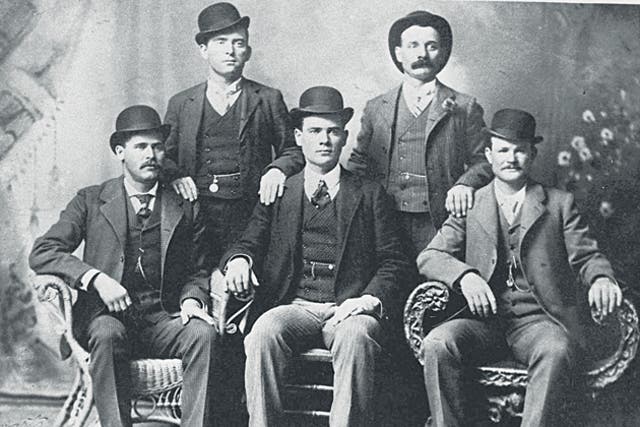 Butch Cassidy (front right) and the Sundance Kid (front left) in a 1900 picture the Wild Bunch gang sent to a bank they had robbed