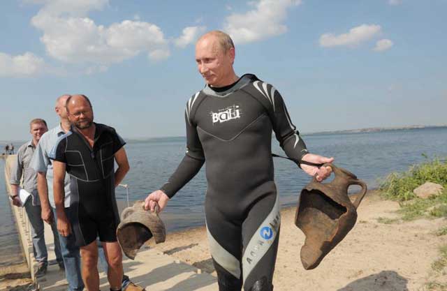 Russian Prime Minister Vladimir Putin emerges from Taman Bay with his relics