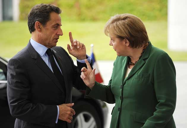Angela Merkel and French President Nicolas Sarkozy