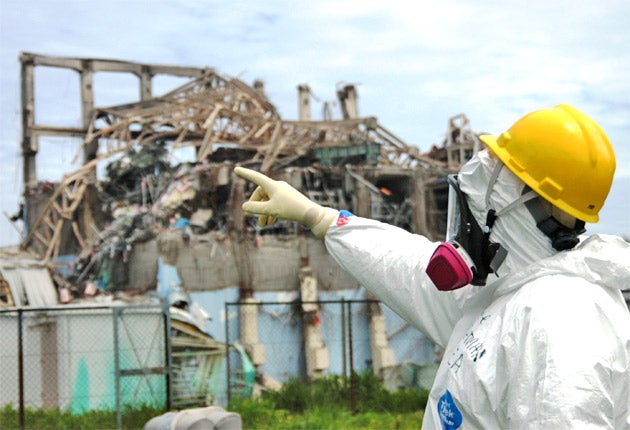 International Atomic Energy Agency fact-finding team leader Mike Weightman inspects the damage to the Fukushima Daiichi nuclear power station in May, 11 weeks into the disaster