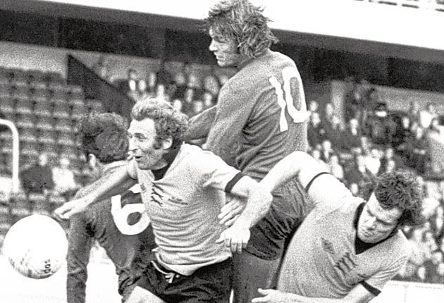 Munro, right, in action for Wolves against Chelsea in 1974