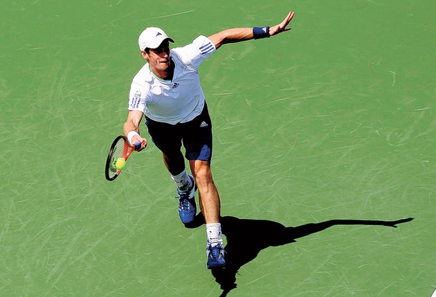Andy Murray plays a forehand return on his way to a convincing win over Alex Bogomolov in Cincinnati