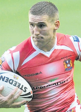 Wigan's Sam Tomkins scored two tries last night to reach 30 for the season