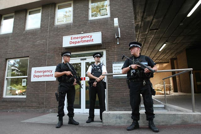 Jersey police stand guard outside St Helier hospital