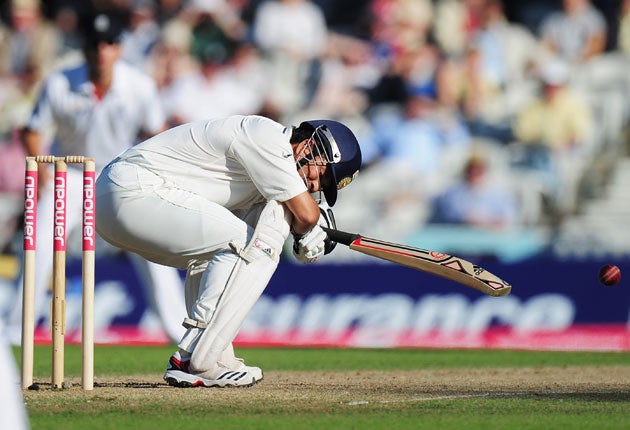 India's Sachin Tendulkar is hit by a bouncer from Stuart Broad at The Oval yesterday
