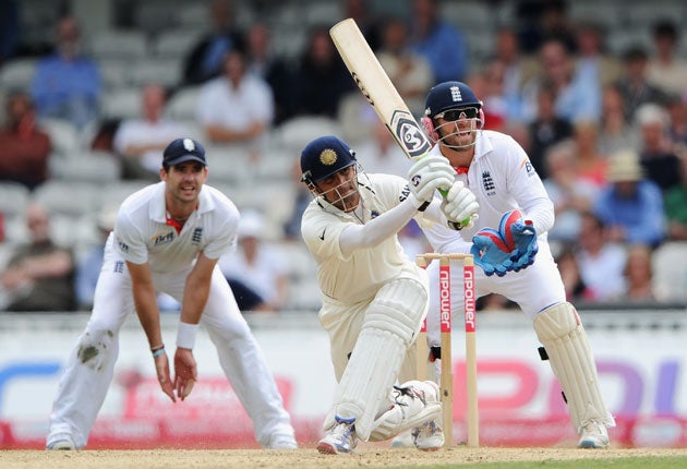 Rahul Dravid, of India, hits out, watched by wicketkeeper Matt Prior and James Anderson at The Oval yesterday