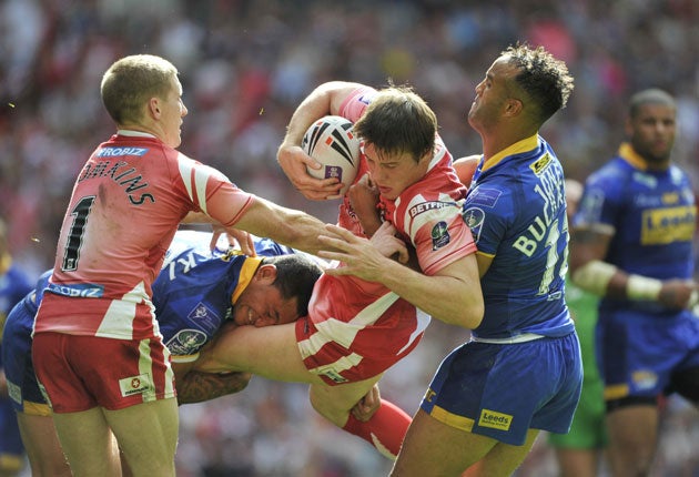 Joel Tomkins is stopped by Jamie-Jones Buchanan (right) and Weller Hauraki on this occasion but the centre still scored the game's best try