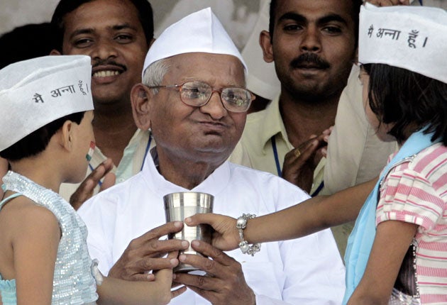 Conservative anti-corruption crusader Anna Hazare breaks his fast in Delhi in 2011