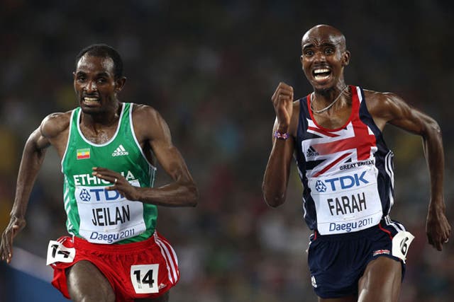 Ethiopia's Ibrahim Jeilan passes a pained Mo Farah in the 10,000m final