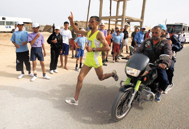 Palestinian Olympic hopeful Nader al Masri competing in a UN-organised marathon in the Gaza Strip in May