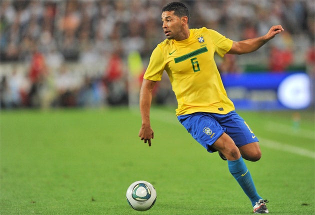 Arsenal are completing a deal to sign the Brazil left-back Andre Santos