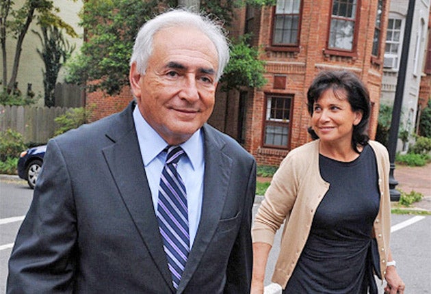 Mr Strauss-Kahn and his wife return to their home in Washington DC after he paid a visit to the IMF