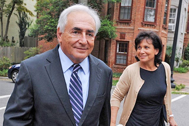 Mr Strauss-Kahn and his wife return to their home in Washington DC after he paid a visit to the IMF