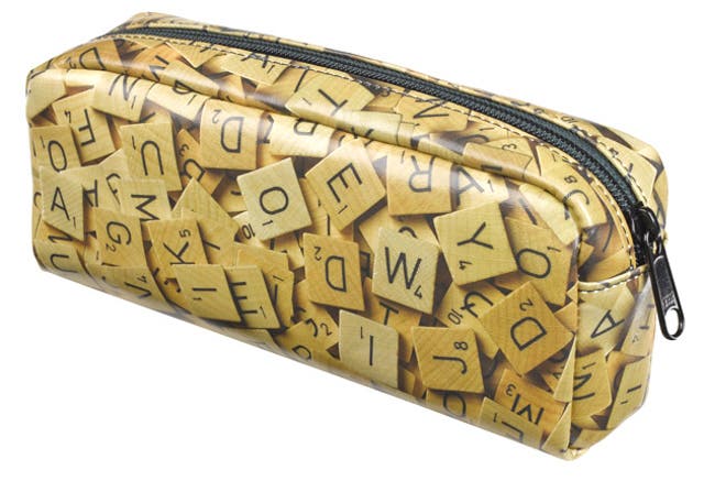 SCRABBLE PENCIL CASE:<br/> Wordy types will love this faux-leather case which is decorated with a montage of scrabble pieces and is roomy enough for all those pens, pencils, rulers and rubbers. <br/> £7.95, wildandwolf.com