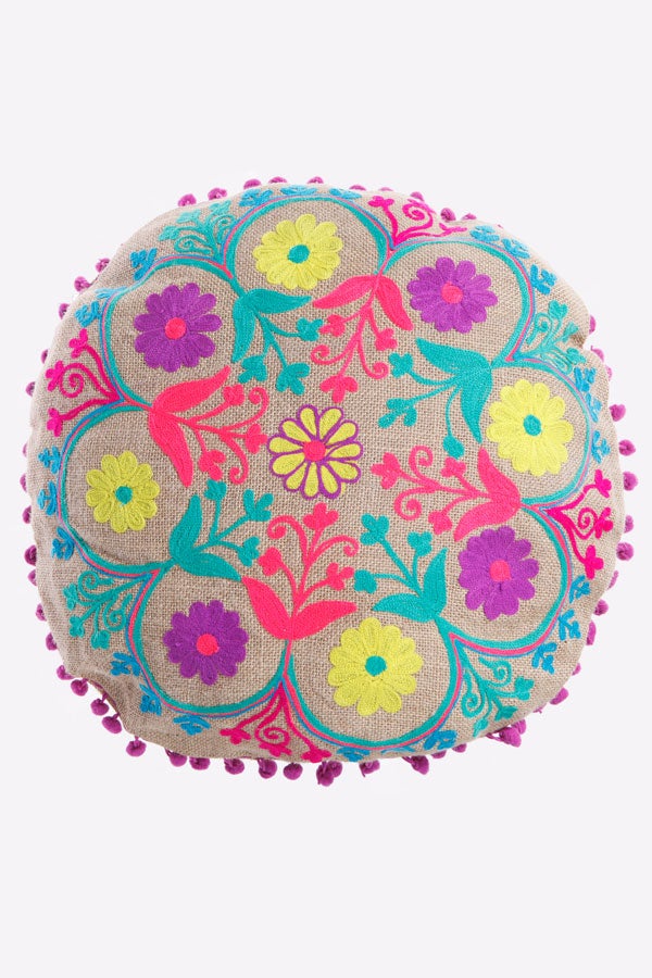 <b>1. Round Mango Cushion:</b> Urban Outfitters, £25. This cosy number puts a fluorescent spin on classic floral embroidery. 020 7759 6390, urbanoutfitters.co.uk