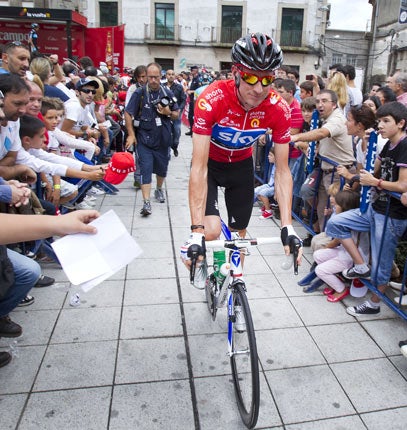 Bradley Wiggins rides during the 12th stage of the Tour of Spain in Pontevedra