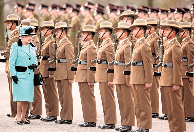 The Queen inspects the Queen's Gurkha Engineers on a visit to barracks in Maidstone; 140 Gurkhas learnt today that they are being
forced out of the Army