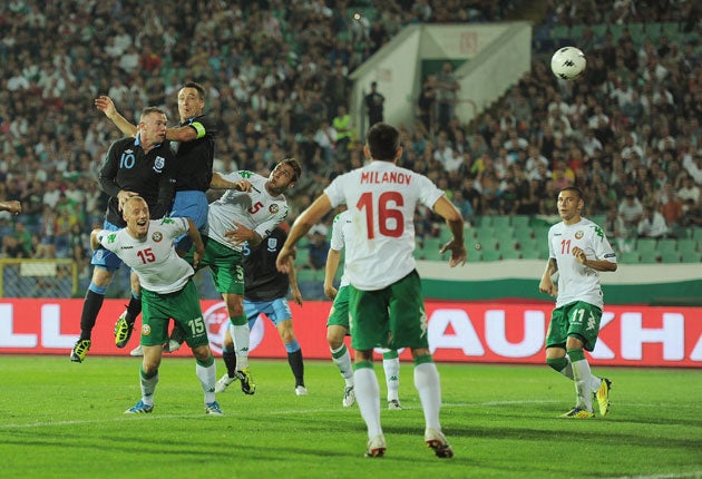 Wayne Rooney (No 10) rises high to score England's second in Sofia