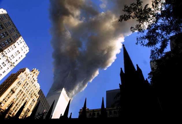 Smoke spews from a tower of the World Trade Center