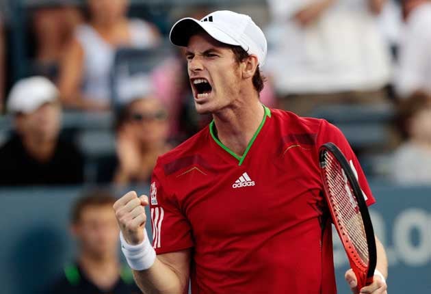 Murray celebrates his win against Robin Haase