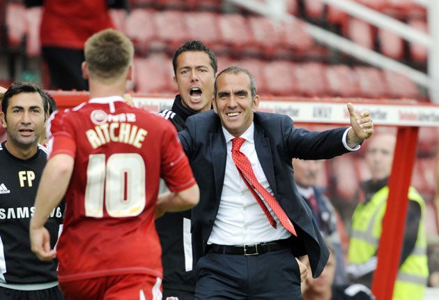 Paolo Di Canio is ready to embrace Swindon's man-of-the-match Matt
Ritchie after his volley brought the home side level