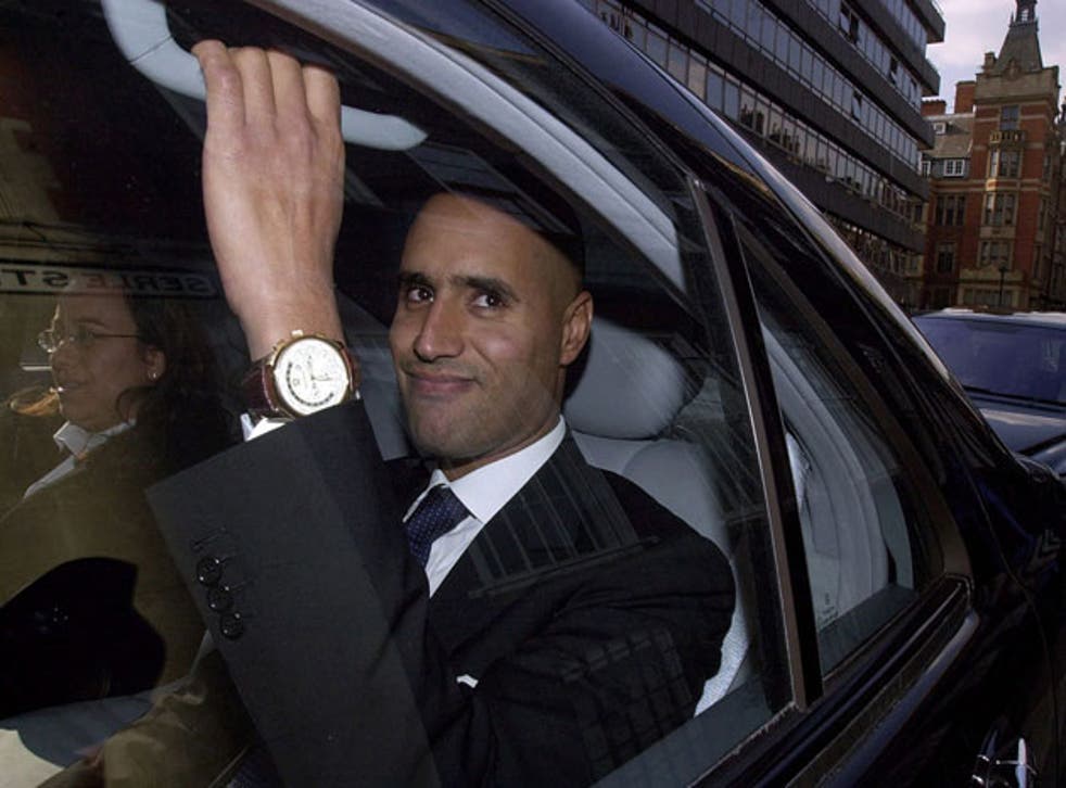 Saif al-Islam leaves the High Court in London in 2002 after winning a libel case against The Sunday Telegraph.