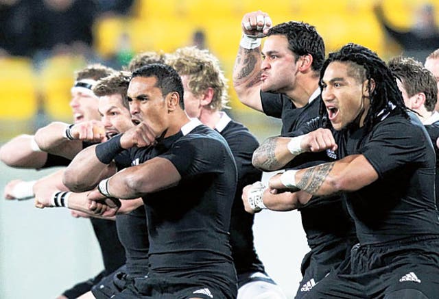 <p>New Zealand All Blacks players perform a haka</p>