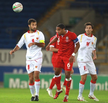 Ashley Williams (middle) was a central figure in Wales' stunning 2-1 victory over Montenegro last Friday night