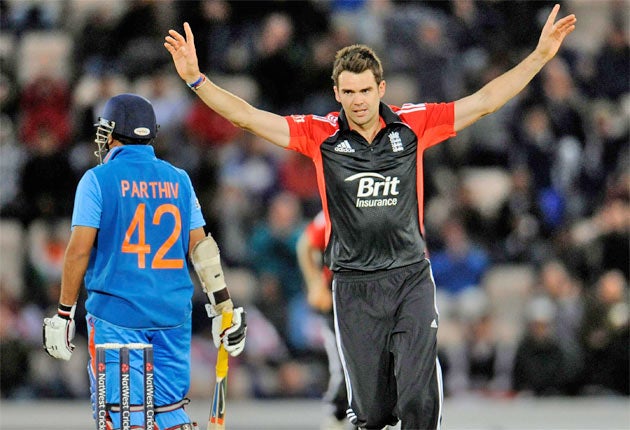 Jimmy Anderson celebrates taking the wicket of Parthiv Patel last night