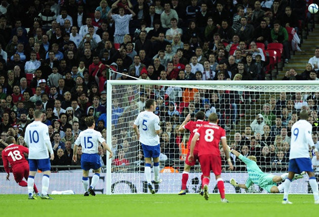 Robert Earnshaw (left) fires over from point-blank range