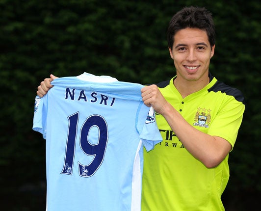 Samir Nasri could miss Saturday's game with Wigan due to a hand injury