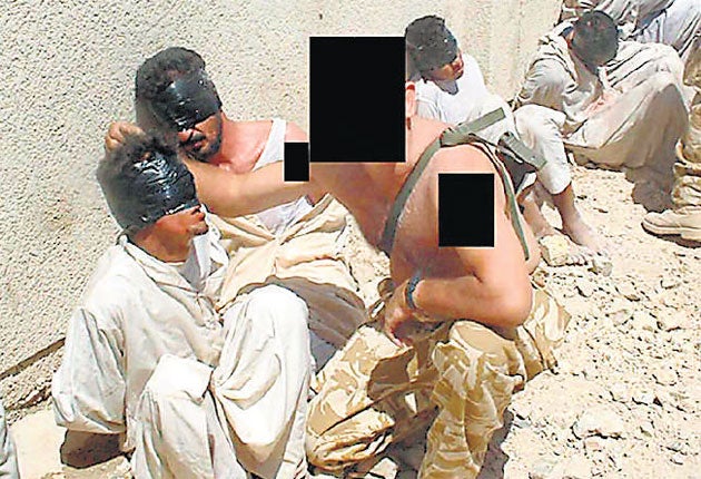 Iraqi prisoners held by 1QLR in 2003 in a photograph shown at the inquiry