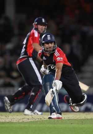 Ravi Bopara (right) and Tim Bresnan scamper a single during England's successful run-chase