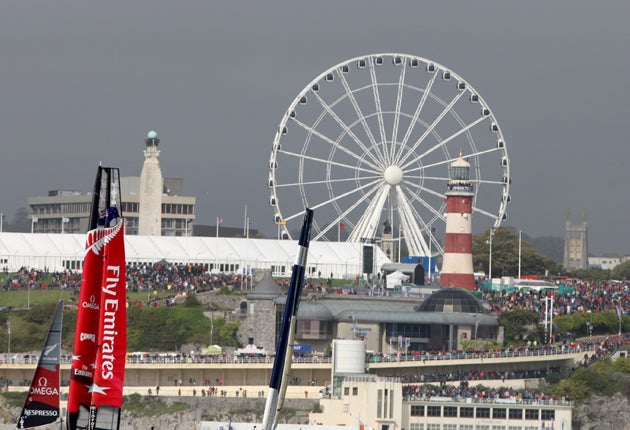 All the fun of the fair as the crowd gathers on Plymouth Hoe to watch the racing in the second of the AC World Series