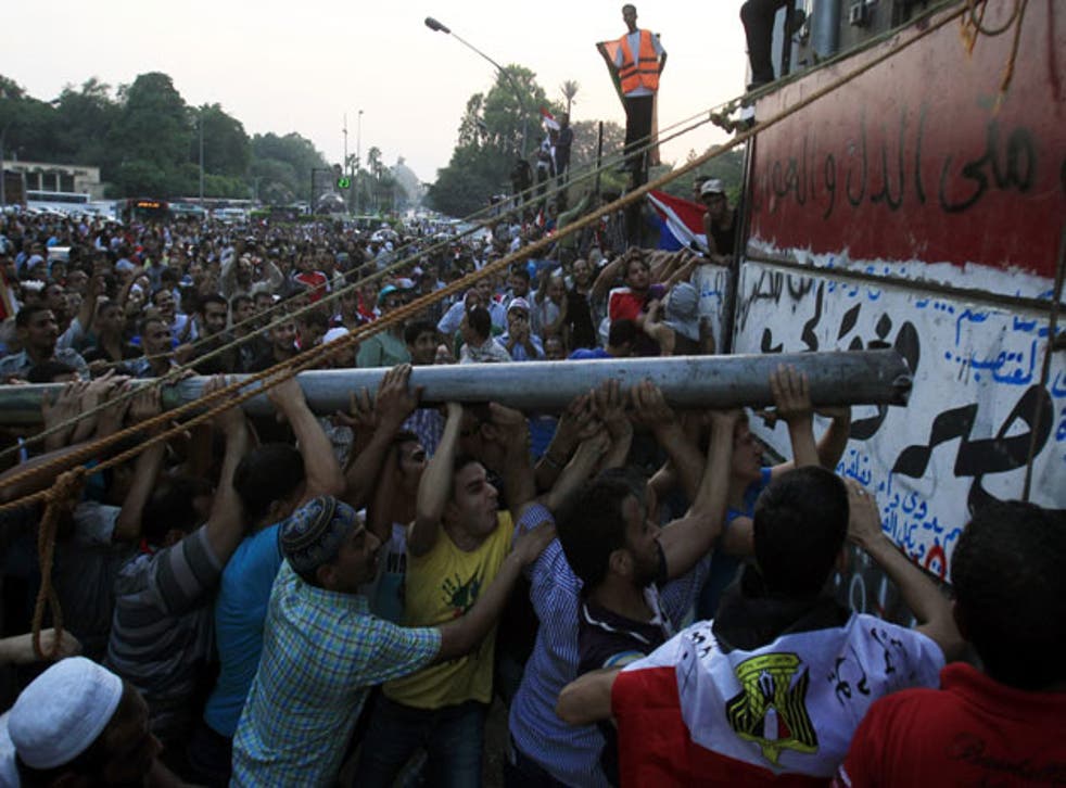 Protesters attack the Israeli embassy in Cairo