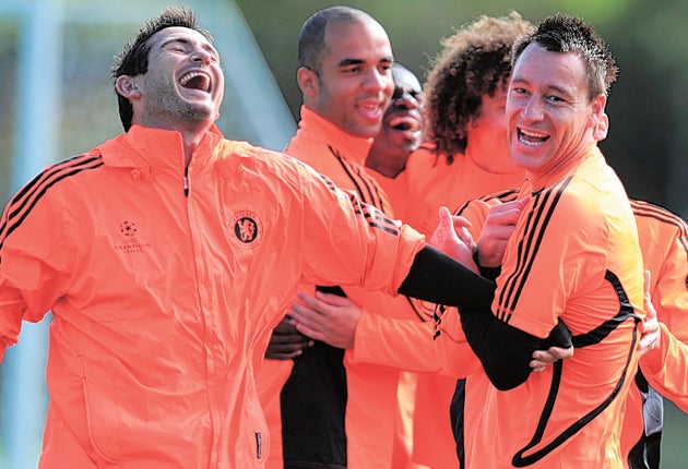 Chelsea team-mates Frank Lampard (left) and John Terry (right) share a lighthearted moment in training