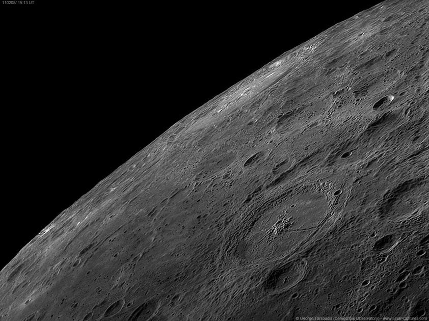 Our Solar System - Highly Commended Crater Petavius, 8 February 2011 by George Tarsoudis (Greece) The Moon's Crater Petavius seen to the lower right of the photograph is almost 200 kilometres wide and over three kilometres
