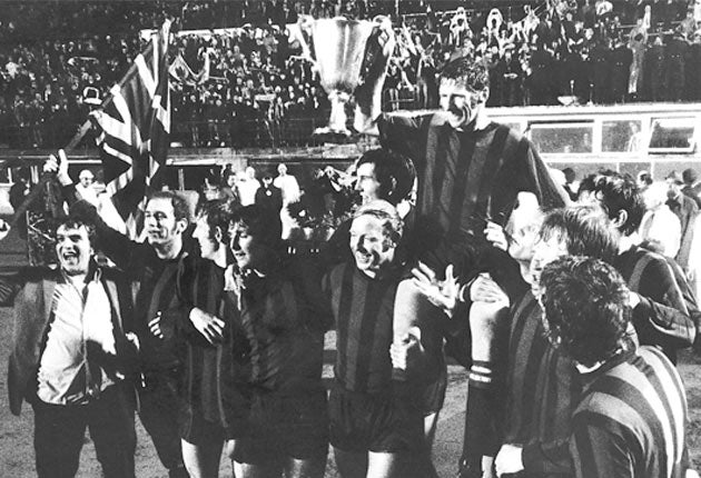 Tony Book holds aloft the European Cup Winners' Cup in 1970, a rare European triumph for Manchester City