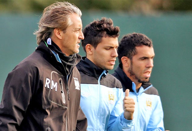 Mancini feels he needs more midfielders