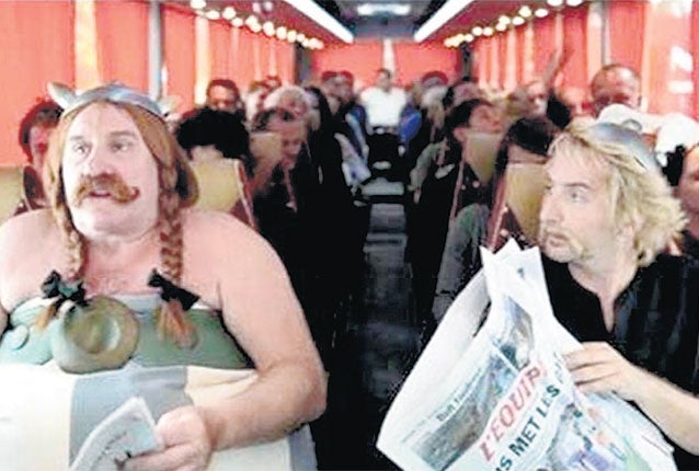 Gérard Depardieu as Obélix and Edouard Baer as Astérix in the spoof video which sends up the incident in which he urinated on a plane