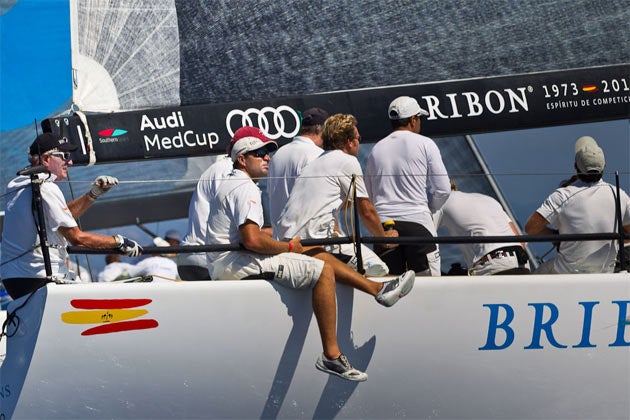 José Cus?, extreme left, watches his Bribón crew take over at the top of his home town Barcelona Trophy in his final Audi MedCup regatta