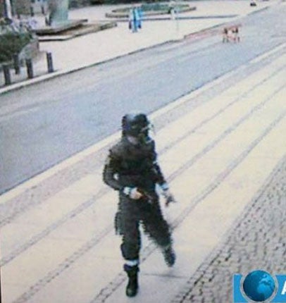 Anders Breivik in police gear seen on CCTV just before the blast