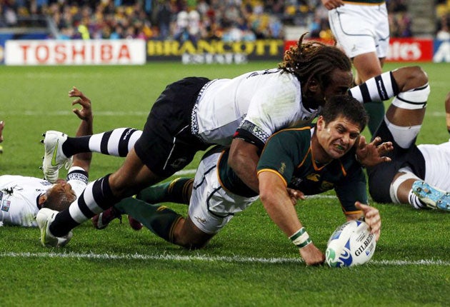 South Africa Springboks' Morne Steyn scores a try during their Pool D match against Fiji