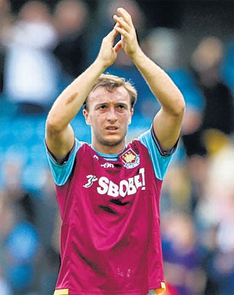 Derby point: Mark Noble salutes the West Ham fans at the end of the match