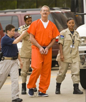 Crime doesn't pay: Allen Stanford arrives in court in Houston