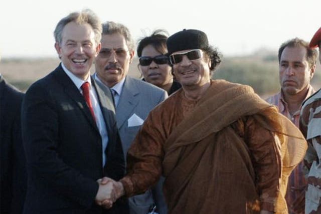 The former PM Tony Blair and Colonel Gaddafi shake hands on 29 May
2007 after an hour long meeting