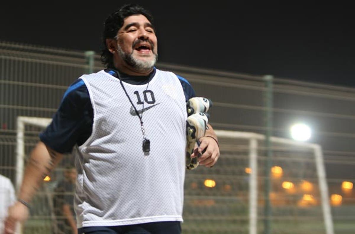 Diego Maradona kicks out at fan in Dubai | The Independent | The ...