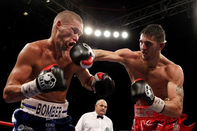 Nathan Cleverly (right) lands a blow on Tony Bellew during their first bout in October 2011