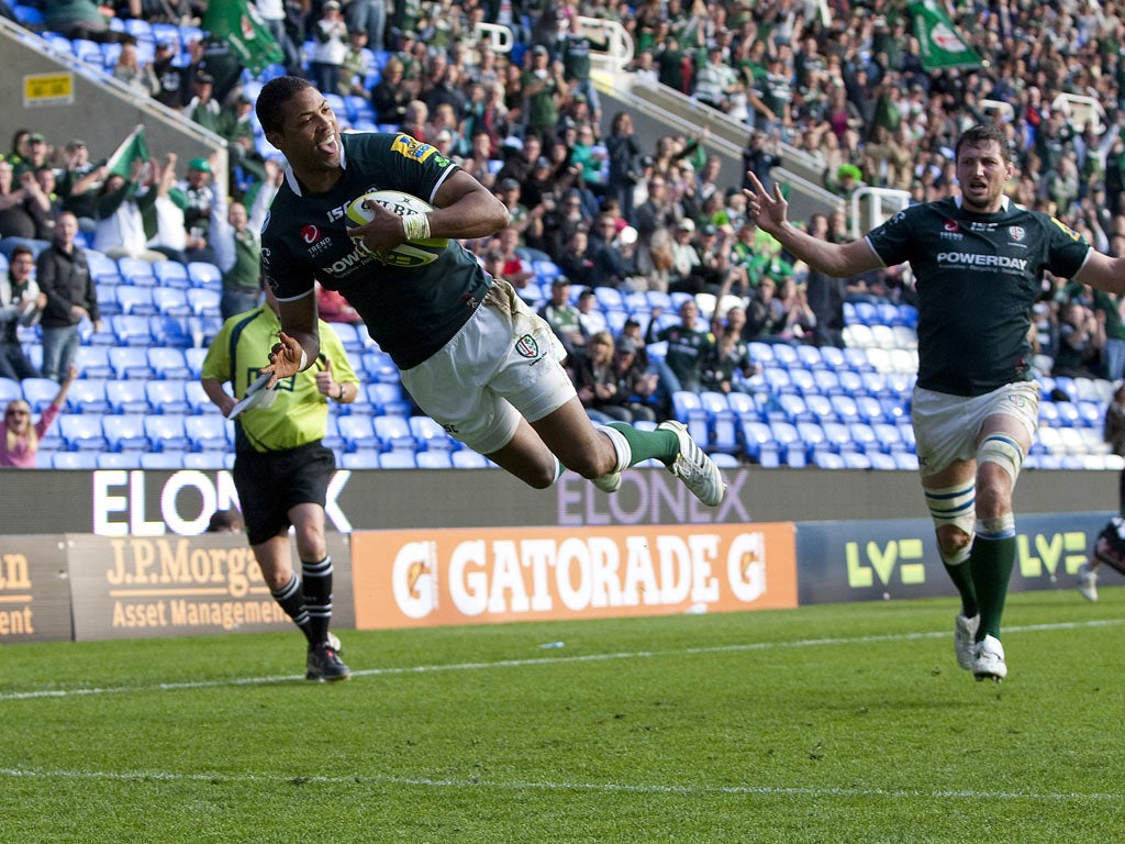 Delon Armitage of London Irish dives over to score a try during the LV=Cup match against Newcastle Falcons at The Madejski