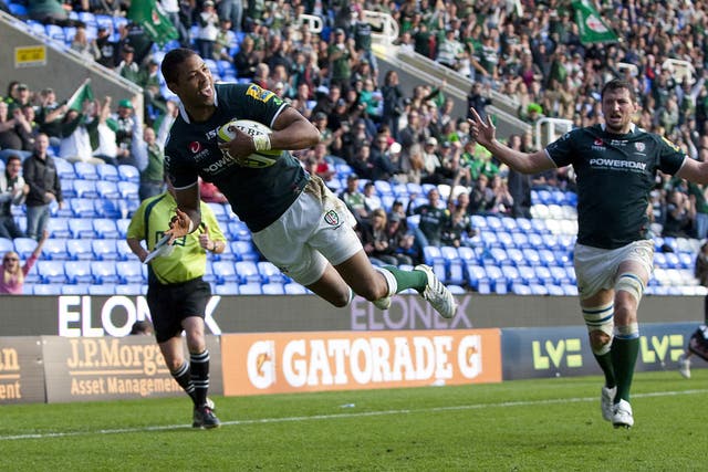 Delon Armitage of London Irish dives over to score a try during the LV=Cup match against Newcastle Falcons at The Madejski